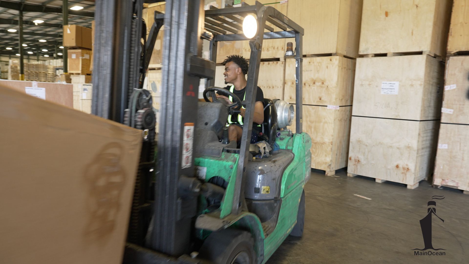 Warehouse logistics using a forklift. We handle warehouse, drayage, packing and logistic needs.